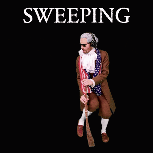 A Man Wearing A Wig And Sunglasses Is Sweeping The Floor GIF