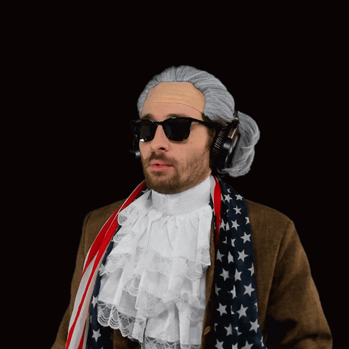 A Man Wearing A Wig And Sunglasses Says " Wait What " GIF