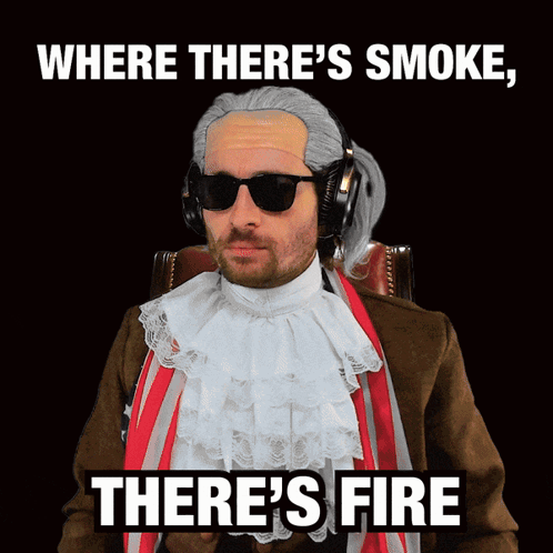 A Man Wearing A Wig And Sunglasses Says Where There 'S Smoke , There 'S Fire GIF