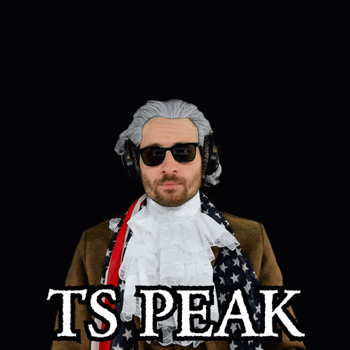 A Man Wearing A Wig And Sunglasses With The Words Ts Peak Above His Head GIF