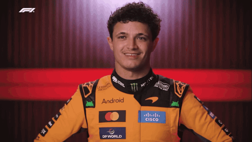 A Man Wearing A Yellow And Black Jacket With The Word Android On It GIF