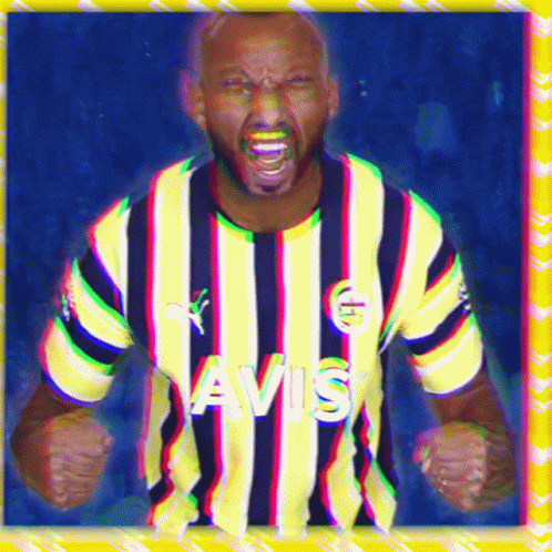A Man Wearing A Yellow And Blue Striped Shirt That Says Avis On It GIF