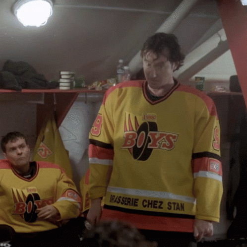 A Man Wearing A Yellow And Red Boys Jersey GIF
