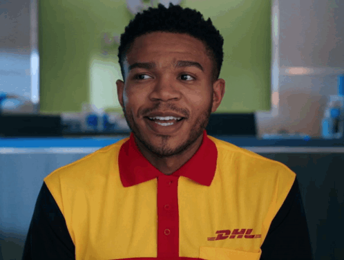 A Man Wearing A Yellow And Red Dhl Polo Shirt GIF