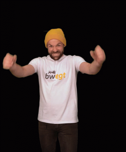 A Man Wearing A Yellow Hat And A White Shirt That Says Bwegt GIF