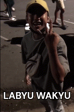 A Man Wearing A Yellow Hat Is Giving The Middle Finger With The Words Labyu Wakyu Below Him GIF