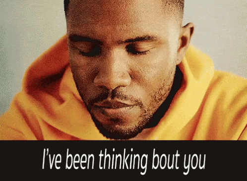 A Man Wearing A Yellow Hoodie Is Thinking About You GIF