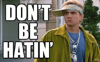 A Man Wearing A Yellow Jacket And A Visor Says `` Do N't Be Hatin '' GIF