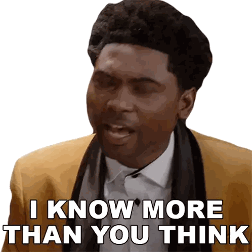 a man wearing a yellow jacket and scarf says i know more than you think