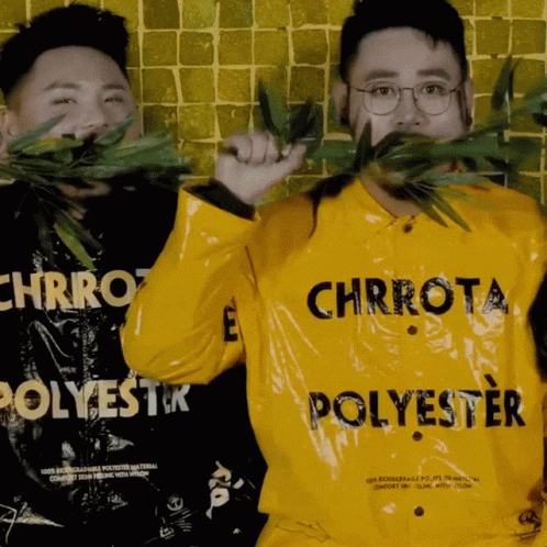 A Man Wearing A Yellow Jacket That Says Chrrot Polyester GIF