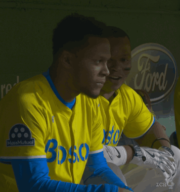 A Man Wearing A Yellow Jersey That Says Boston GIF