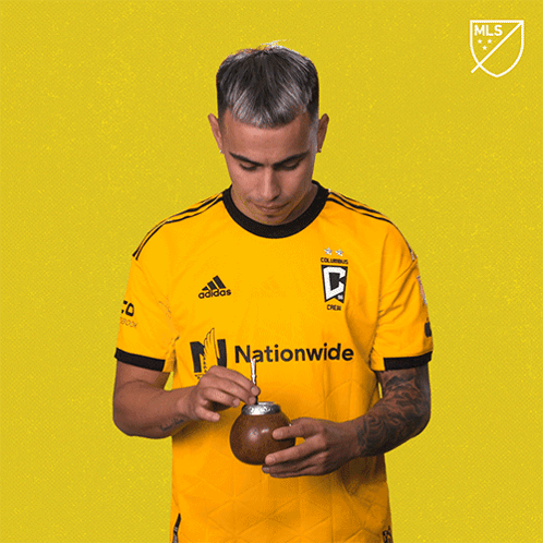A Man Wearing A Yellow Jersey That Says Nationwide GIF