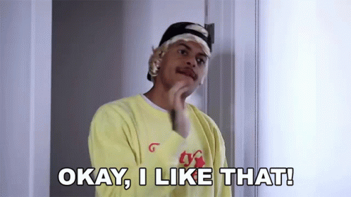 A Man Wearing A Yellow Shirt And A Headband Says Okay , I Like That ! GIF
