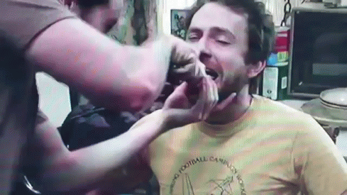 A Man Wearing A Yellow Shirt That Says ' No Football Camp ' On It GIF