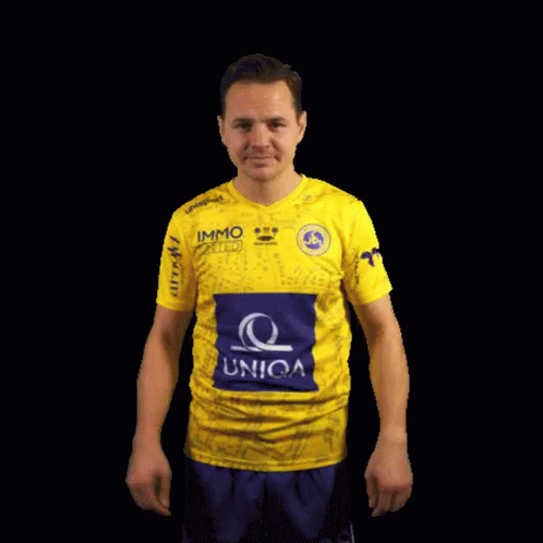 A Man Wearing A Yellow Shirt That Says Union GIF