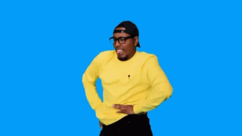 A Man Wearing A Yellow Sweater And A Hat Is Dancing On A Blue Background . GIF
