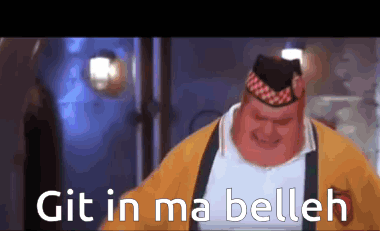 A Man Wearing A Yellow Sweater And Suspenders Is Smiling And Says Git In Ma Belleh GIF