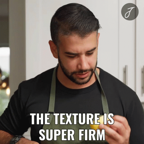 A Man Wearing An Apron Is Holding A Lemon And Says The Texture Is Super Firm GIF