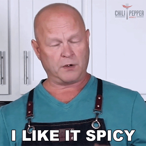 A Man Wearing An Apron Is Saying I Like It Spicy GIF