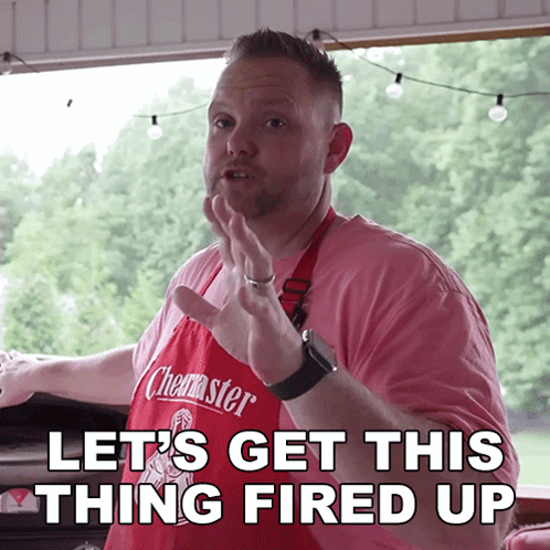 A Man Wearing An Apron That Says ' Chester ' On It GIF