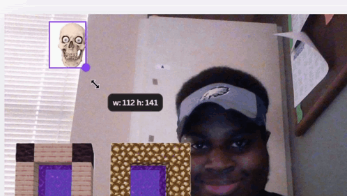 A Man Wearing An Eagles Hat Stands In Front Of A Skeleton And A Frame GIF