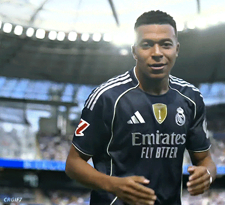 A Man Wearing An Emirates Fly Bitter Jersey Is Running GIF