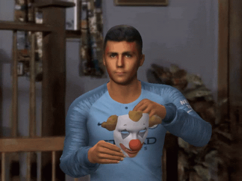A Man Wearing An Etihad Airways Jersey Is Wearing A Clown Mask On His Face GIF
