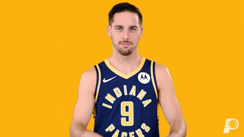 A Man Wearing An Indiana Pacers Jersey Looks Through His Hands GIF