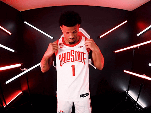 A Man Wearing An Ohio State Jersey With The Number 1 GIF