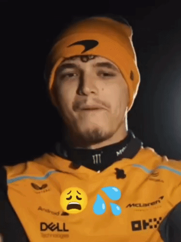 A Man Wearing An Orange Beanie And A Dell Shirt GIF