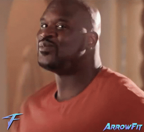 A Man Wearing An Orange Shirt With Arrowfit Written On The Bottom GIF