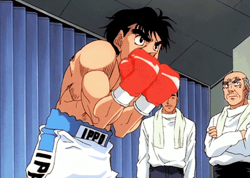 A Man Wearing Boxing Gloves With The Letters Ippi On His Belt GIF