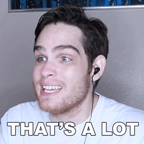 A Man Wearing Ear Buds Smiles With The Words That 'S A Lot Above Him GIF