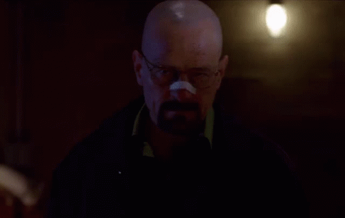 A Man Wearing Glasses And A Bandage On His Nose GIF