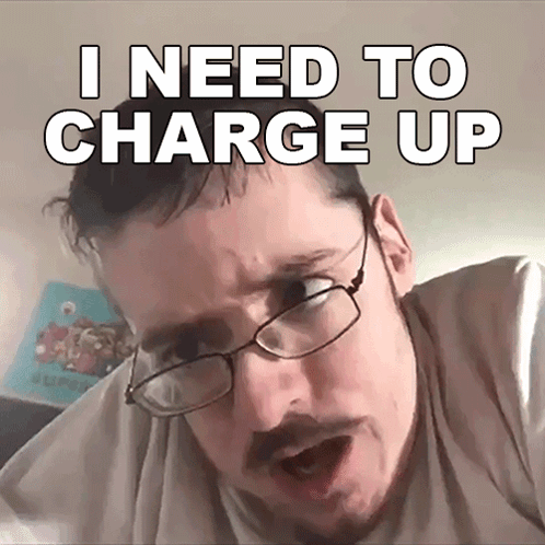 A Man Wearing Glasses And A Beard Says I Need To Charge Up GIF