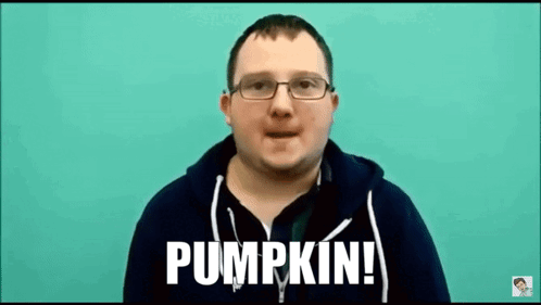 A Man Wearing Glasses And A Black Hoodie Is Talking About Pumpkin . GIF