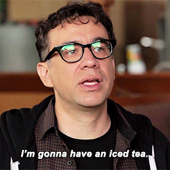 A Man Wearing Glasses And A Black Hoodie Says " I 'M Gonna Have An Iced Tea " GIF