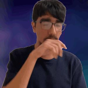 A Man Wearing Glasses And A Black Shirt Covering His Mouth With His Hand GIF