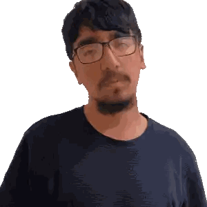 a man wearing glasses and a black shirt has a beard