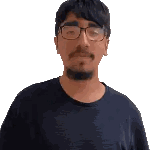 a man wearing glasses and a black shirt looks at the camera