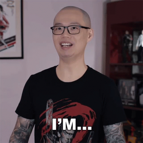A Man Wearing Glasses And A Black Shirt Says I 'M GIF
