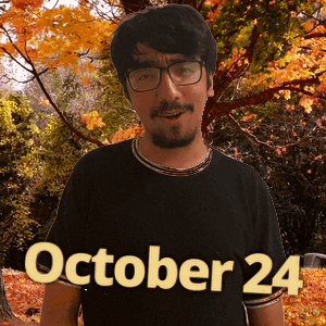 A Man Wearing Glasses And A Black Shirt That Says October 24 On It GIF