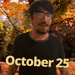 A Man Wearing Glasses And A Black Shirt With October 25 On It GIF