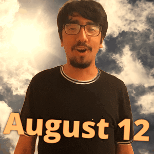 A Man Wearing Glasses And A Black Shirt With The Date August 12 On It GIF