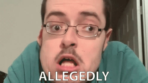 A Man Wearing Glasses And A Blue Shirt Has Allegedly Written On His Face GIF