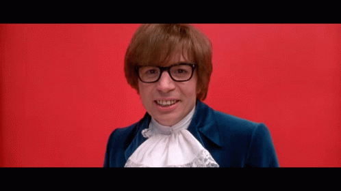 Man In Glasses Blue Suit Says Yeah Baby GIF