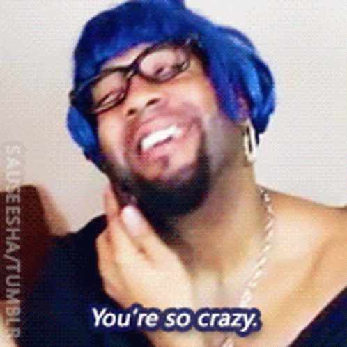 A Man Wearing Glasses And A Blue Wig Is Saying You 'Re So Crazy GIF