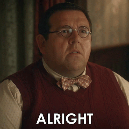 A Man Wearing Glasses And A Bow Tie Has The Word Alright Above His Head GIF