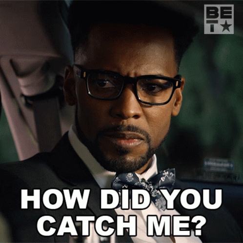 A Man Wearing Glasses And A Bow Tie Is Asking How Did You Catch Me GIF