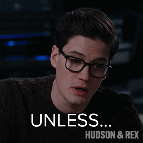 A Man Wearing Glasses And A Brown Sweater Says Unless Hudson & Rex GIF